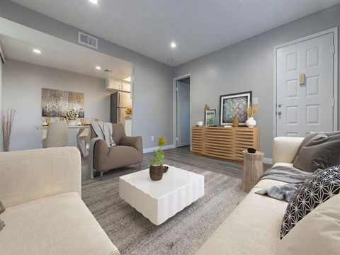 a living room with a couch and a coffee table